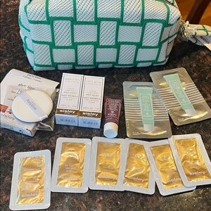Sisley-Paris Skincare Collection with Green and White Bag